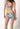 Rückansicht von einem Damen-Model, das HU attentivesky flowers mikrofaser Rio Slip trägt