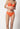 Vorderansicht von einem Damen-Model, das HU almost orange mikrofaser Rio Slip trägt