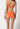 Rückansicht von einem Damen-Model, das HU almost orange mikrofaser Rio Slip trägt