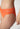Nahaufnahme von einem Damen-Model, das HU almost orange mikrofaser Rio Slip trägt