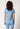 Rückansicht von einem Damen-Model, das HU prismablue onelineflowers modal/viskose/tencel Shirt kurzarm trägt