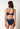 Rückansicht von einem Damen-Model, das HU alp night mikrofaser Minimizer BH trägt