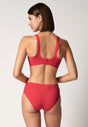 Rückansicht von einem Damen-Model, das HU bittersweet mikrofaser Soft BH herausn. Pads trägt
