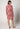 Rückansicht von einem Damen-Model, das HU garnet rose roses baumwolle Nachthemd langarm trägt
