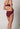 Rückansicht von einem Damen-Model, das HU maroon banner mikrofaser Rio Slip trägt
