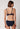 Rückansicht von einem Damen-Model, das HU baritone blue mikrofaser Schalen BH trägt