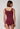 Rückansicht von einem Damen-Model, das HU maroon banner modal/viskose/tencel Tanktop trägt