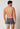 Rückansicht von einem Herren-Model, das HU turbulence stripes selection baumwolle Pants Doppelpack trägt