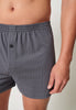 Nahaufnahme von einem Herren-Model, das HU turbulence herringbone baumwolle Boxershorts trägt