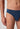Nahaufnahme von einem Herren-Model, das HU ensign blue minimal modal/viskose/tencel Slip trägt