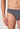 Nahaufnahme von einem Herren-Model, das HU turbulence herringbone modal/viskose/tencel Slip trägt
