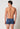 Rückansicht von einem Herren-Model, das HU ensign blue minimal modal/viskose/tencel Pants trägt