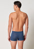 Rückansicht von einem Herren-Model, das HU ensign blue minimal modal/viskose/tencel Pants trägt