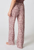 Rückansicht von einem Damen-Model, das HU painted paisley baumwolle Hose lang trägt