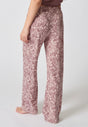 Rückansicht von einem Damen-Model, das HU painted paisley baumwolle Hose lang trägt