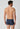 Rückansicht von einem Herren-Model, das HU dark denim modal/viskose/tencel Pants trägt
