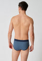 Rückansicht von einem Herren-Model, das HU dark denim rhombus baumwolle Slip mit Eingriff trägt
