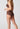 Rückansicht von einem Damen-Model, das HU plum truffle mikrofaser Maxi Slip trägt