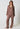 Vorderansicht von einem Damen-Model, das HU rhubarb stripes modal/viskose/tencel Pyjama lang trägt