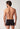 Rückansicht von einem Herren-Model, das HU black baumwolle Pants Doppelpack trägt