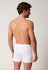 Rückansicht von einem Herren-Model, das HU white baumwolle Pant kurz mit Eingriff Doppelpack trägt