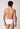 Rückansicht von einem Herren-Model, das HU white baumwolle Slip mit Eingriff Doppelpack trägt