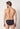 Rückansicht von einem Herren-Model, das HU black baumwolle Slip Doppelpack trägt