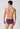 Rückansicht von einem Herren-Model, das HU black stripes selection baumwolle Slip Doppelpack trägt