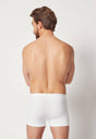 Rückansicht von einem Herren-Model, das HU white baumwolle Pants Doppelpack trägt