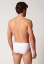 Rückansicht von einem Herren-Model, das HU white baumwolle Slip 3er Pack trägt