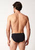 Rückansicht von einem Herren-Model, das HU black baumwolle Slip 3er Pack trägt