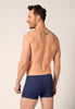 Rückansicht von einem Herren-Model, das HU blue-black selection baumwolle Pants 3er Pack trägt