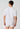 Rückansicht von einem Herren-Model, das HU white baumwolle Shirt kurzarm trägt