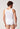 Rückansicht von einem Herren-Model, das HU white baumwolle Tanktop trägt