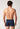 Rückansicht von einem Herren-Model, das HU navy baumwolle Pants mit Eingriff trägt