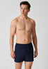 Vorderansicht von einem Herren-Model, das HU dress blue baumwolle Boxershorts trägt