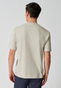 Rückansicht von einem Herren-Model, das HU beige melange baumwolle Shirt kurzarm trägt