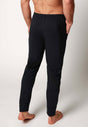 Rückansicht von einem Herren-Model, das HU black baumwolle Hose lang trägt