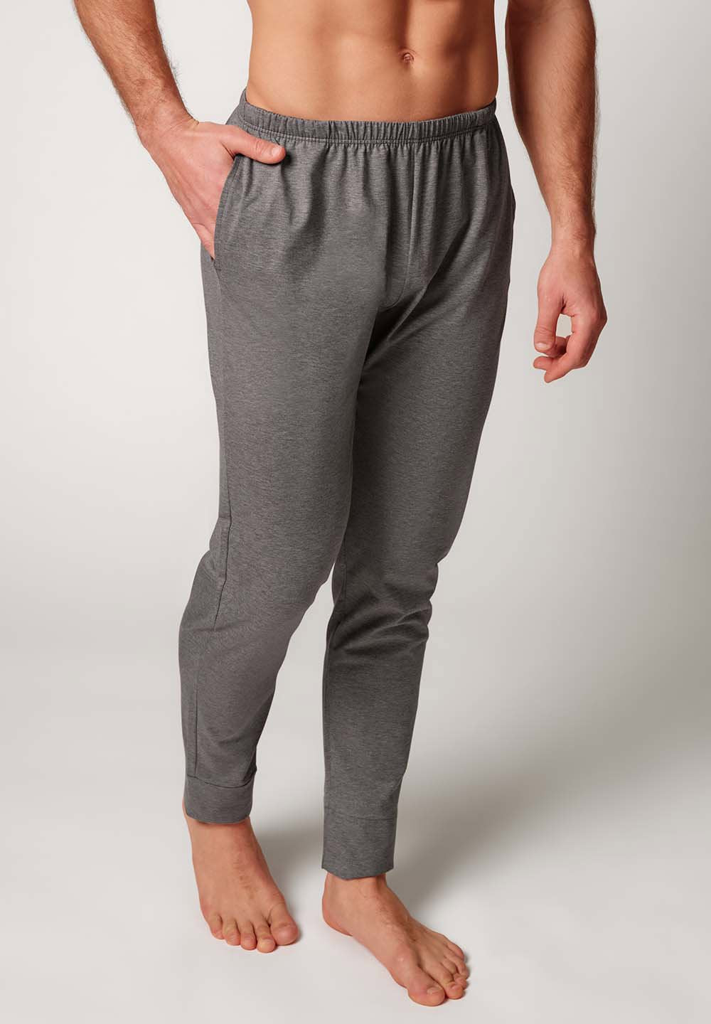 Vorderansicht von einem Herren-Model, das HU grey melange baumwolle Hose lang trägt