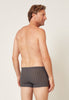 Rückansicht von einem Herren-Model, das HU black pinstripe modal/viskose/tencel Pants trägt