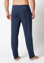 Rückansicht von einem Herren-Model, das HU dress blue baumwolle Hose lang trägt
