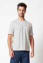 Vorderansicht von einem Herren-Model, das HU beige melange baumwolle Shirt kurzarm trägt