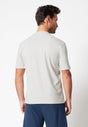 Rückansicht von einem Herren-Model, das HU beige melange baumwolle Shirt kurzarm trägt