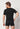 Rückansicht von einem Herren-Model, das HU black modal/viskose/tencel Shirt kurzarm trägt