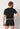 Rückansicht von einem Herren-Model, das HU black modal/viskose/tencel Pants trägt