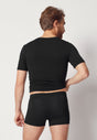 Rückansicht von einem Herren-Model, das HU black modal/viskose/tencel Pants trägt