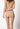 Rückansicht von einem Damen-Model, das HU nude baumwolle Rio Slip Doppelpack trägt