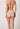 Rückansicht von einem Damen-Model, das HU dusty rose mikrofaser Maxi Slip trägt