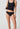 Vorderansicht von einem Damen-Model, das HU black mikrofaser String trägt