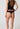 Rückansicht von einem Damen-Model, das HU black mikrofaser String trägt